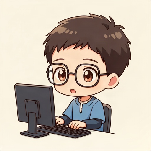 A boy with glasses using a computer.